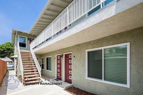 Long Beach apartment for rent - an apartment building with stairs and a balcony