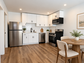Inglewood apartment for rent - A modern kitchen with wooden floors and stainless steel appliances.