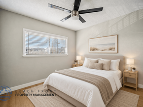 Hawthorne apartment for rent - A bedroom with a bed, nightstands, and a ceiling fan.