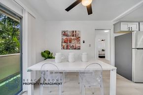 Valley Village apartment for rent - the stairwell of a home with a glass railing and a large window