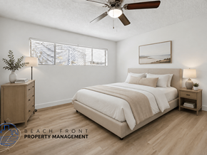 La Habra apartment for rent - A bedroom with a bed, nightstands, and a ceiling fan.