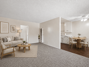 Inglewood apartment for rent - A living room with a grey carpet and a grey sofa.