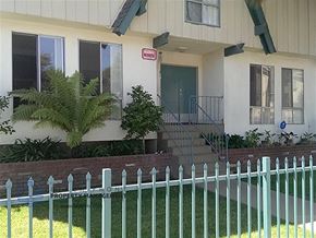 Inglewood apartment for rent - a house with a white fence in front of it