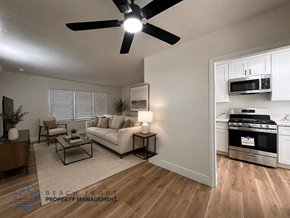 Santa Ana apartment for rent - A modern living room with a kitchen in the background.