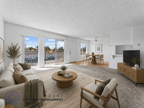 Huntington Beach apartment for rent - A living room with a couch, a coffee table, and a television.