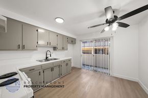 Hawthorne apartment for rent - A kitchen with a fan and a sink.