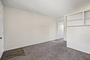 Hawthorne apartment for rent - A room with a carpeted floor and white walls.