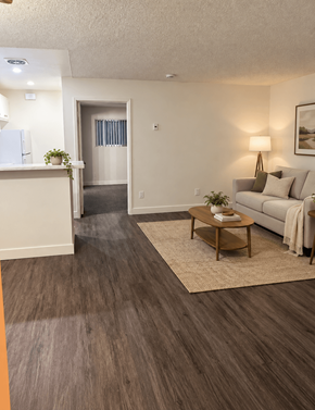 Torrance apartment for rent - A living room with a couch, coffee table, and lamp.