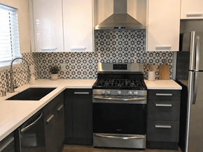 Los Angeles apartment for rent - A modern kitchen with black and white tiles.