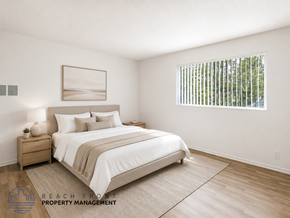 Harbor City apartment for rent - A bedroom with a large bed, a nightstand, and a window with blinds.