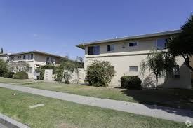 Garden Grove apartment for rent - two apartment buildings on the side of a sidewalk