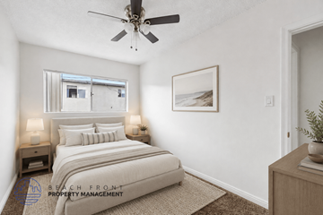 Hawthorne apartment for rent - A bedroom with a bed, nightstands, and a ceiling fan.