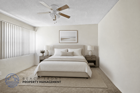 Wilmington apartment for rent - A bedroom with a bed, nightstands, and a ceiling fan.