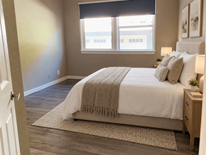 Redondo Beach apartment for rent - A bedroom with a large bed and a window.