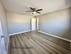 Redondo Beach apartment for rent - a living room with wood flooring and a ceiling fan