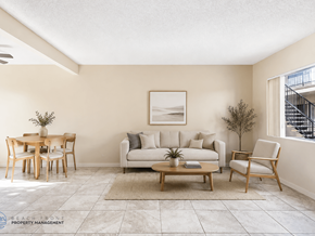 Hawthorne apartment for rent - A living room with a couch, chairs, and a coffee table.