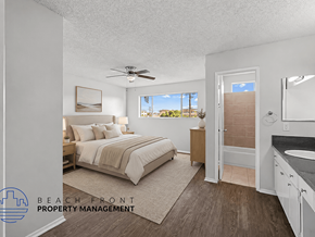 Hawthorne apartment for rent - A bedroom with a bed, dresser, and window.