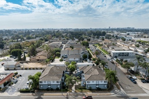 Orange apartment for rent - A residential area with houses and streets.