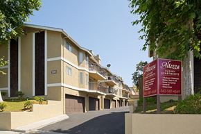 La Habra apartment for rent - a row of apartments with a sign in front of them