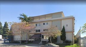 Inglewood apartment for rent - a building with a car parked in front of it