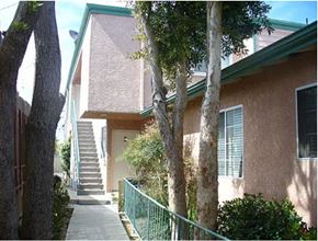 Harbor City apartment for rent - A tree is in front of a house.