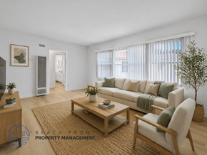 Los Angeles apartment for rent - A living room with a sofa, armchair, and coffee table.