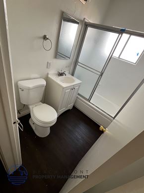 Torrance apartment for rent - A white toilet and sink in a small bathroom.