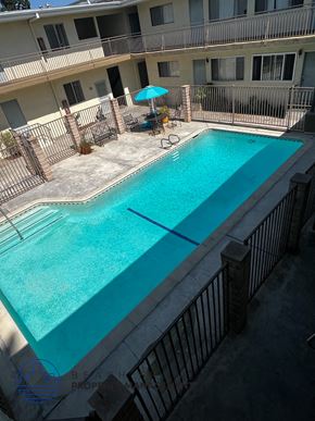 Torrance apartment for rent - A small pool with a fence around it.
