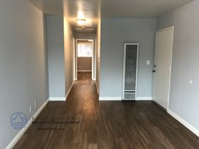 Los Angeles apartment for rent - a renovated living room and hallway with wood floors and blue walls