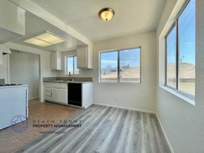 Lawndale apartment for rent - a kitchen with a large window and a sink and a counter