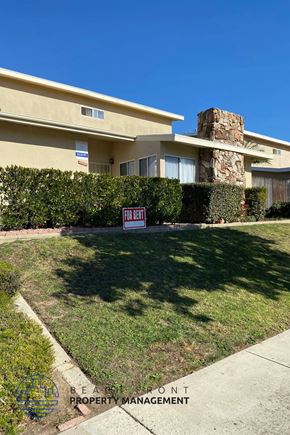 Torrance apartment for rent - A house with a "For Sale" sign in front of it.