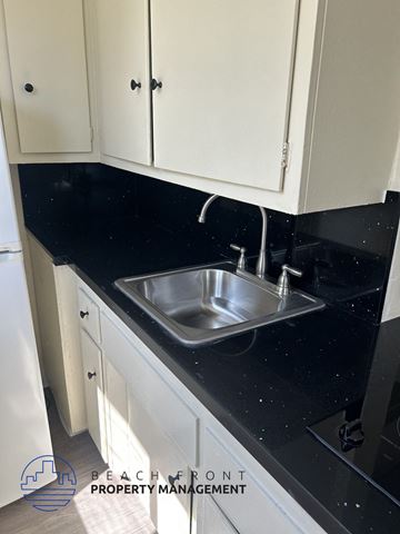 Los Angeles apartment for rent - A kitchen with a sink and cabinets.