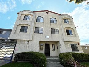 Hawthorne apartment for rent - the front of a building with a door and windows