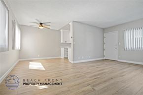 Playa Del Rey apartment for rent - A spacious room with a ceiling fan and wooden flooring.