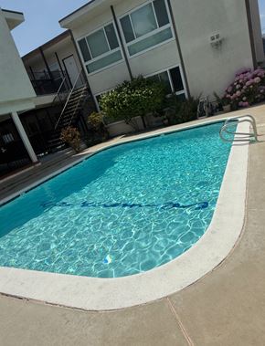 Torrance apartment for rent - A small pool with a ladder in the middle.