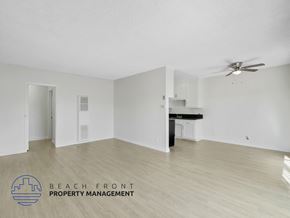 Inglewood apartment for rent - A spacious room with a ceiling fan and a kitchenette.