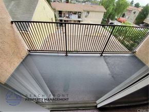 Long Beach apartment for rent - a view of the bottom of a balcony with a gate on it