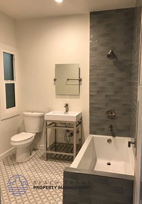 Los Angeles apartment for rent - a bathroom with a toilet and a tub and a sink