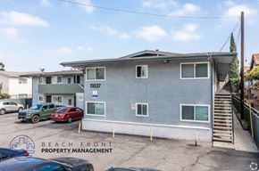 Norwalk apartment for rent - A building with the number 1037 on it is managed by Beach Front Property Management.