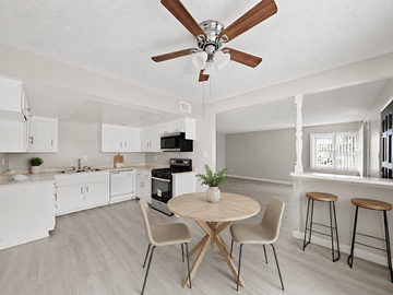 Anaheim apartment for rent - A kitchen with a table and chairs.