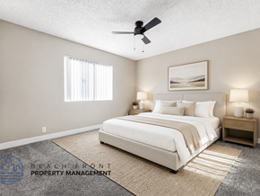 Hawthorne apartment for rent - A bedroom with a bed, nightstands, and a ceiling fan.
