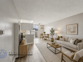Alhambra apartment for rent - A living room with a couch, coffee table, and a lamp.