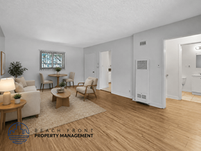 Los Angeles apartment for rent - A living room with a couch, chairs, and a coffee table.