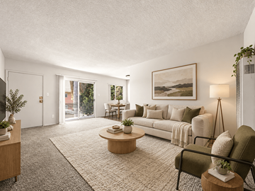 Inglewood apartment for rent - A living room with a couch, coffee table, and a painting on the wall.