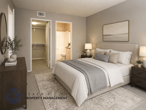 San Pedro apartment for rent - A bedroom with a large bed, a dresser, and a mirror.