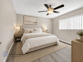 Gardena apartment for rent - A bedroom with a large bed and a ceiling fan.
