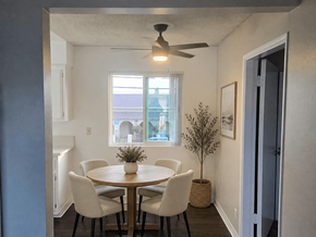 Norwalk apartment for rent - A dining room with a round table and chairs.