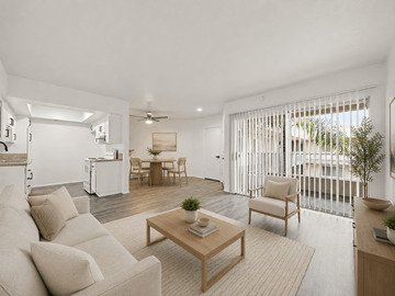 Long Beach apartment for rent - A living room with a white couch and a wooden coffee table.