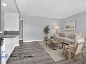 Hawthorne apartment for rent - A living room with a couch, chair, and coffee table.
