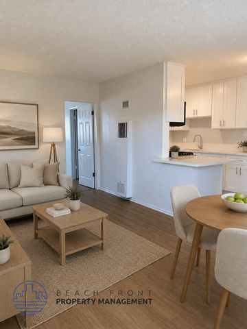 Buena Park apartment for rent - A living room with a couch, a coffee table, and a dining table with chairs.